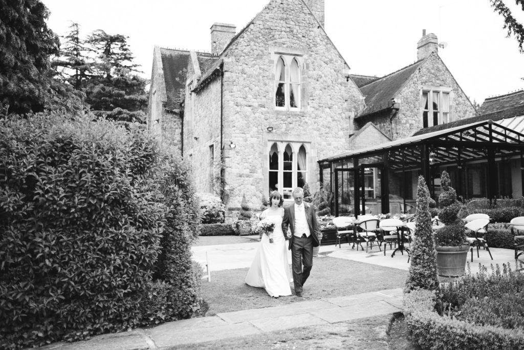 bride and dad makes entrance at Knowle Country House