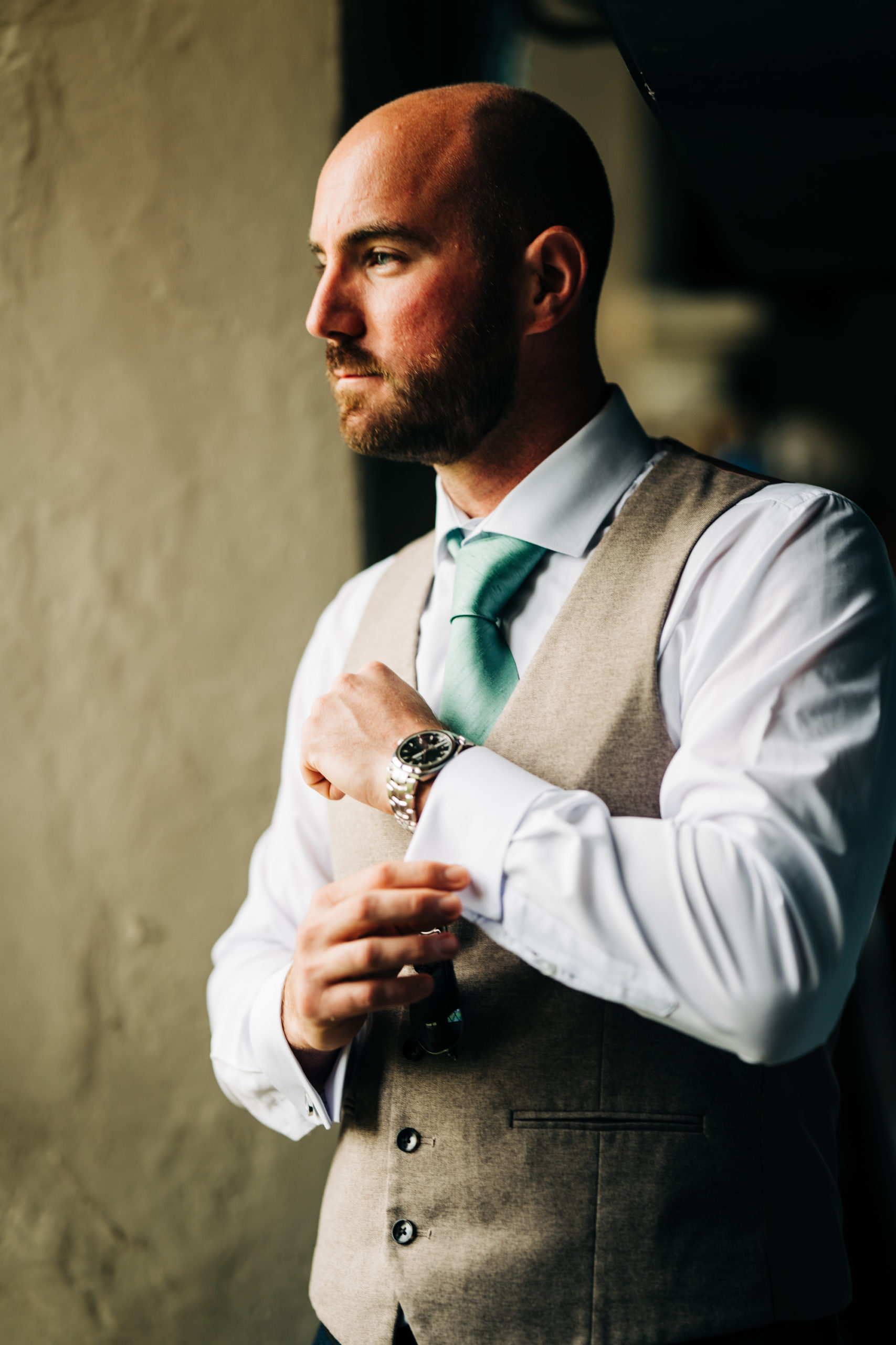 groom preparations before getting married at The Great Barn