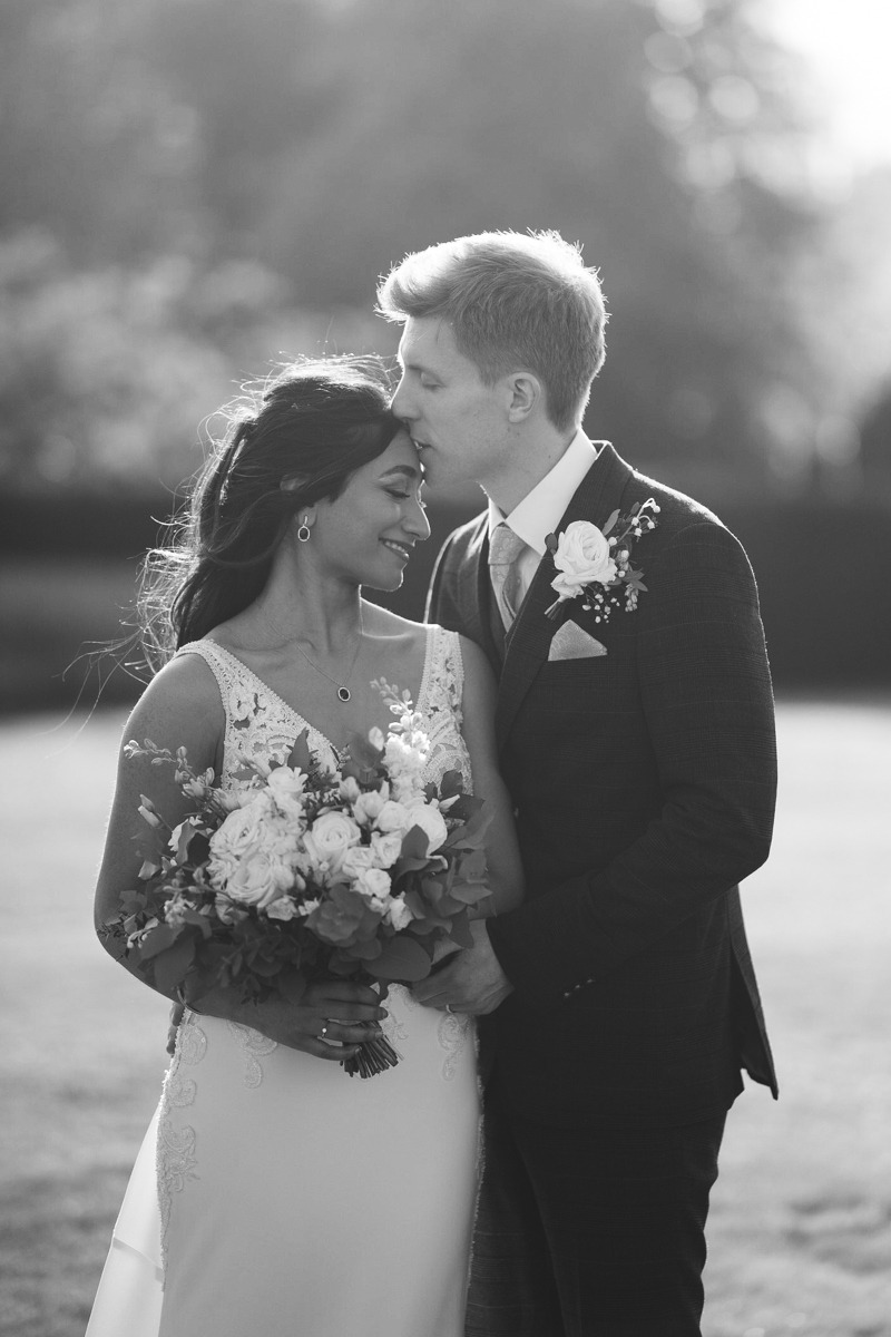 bride and groom at Eastwell Manor wedding kent
