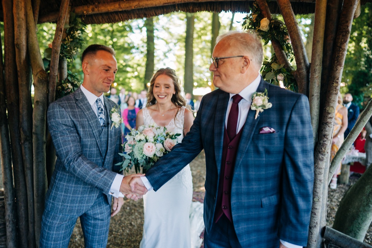dad hands over bride at Crown Lodge